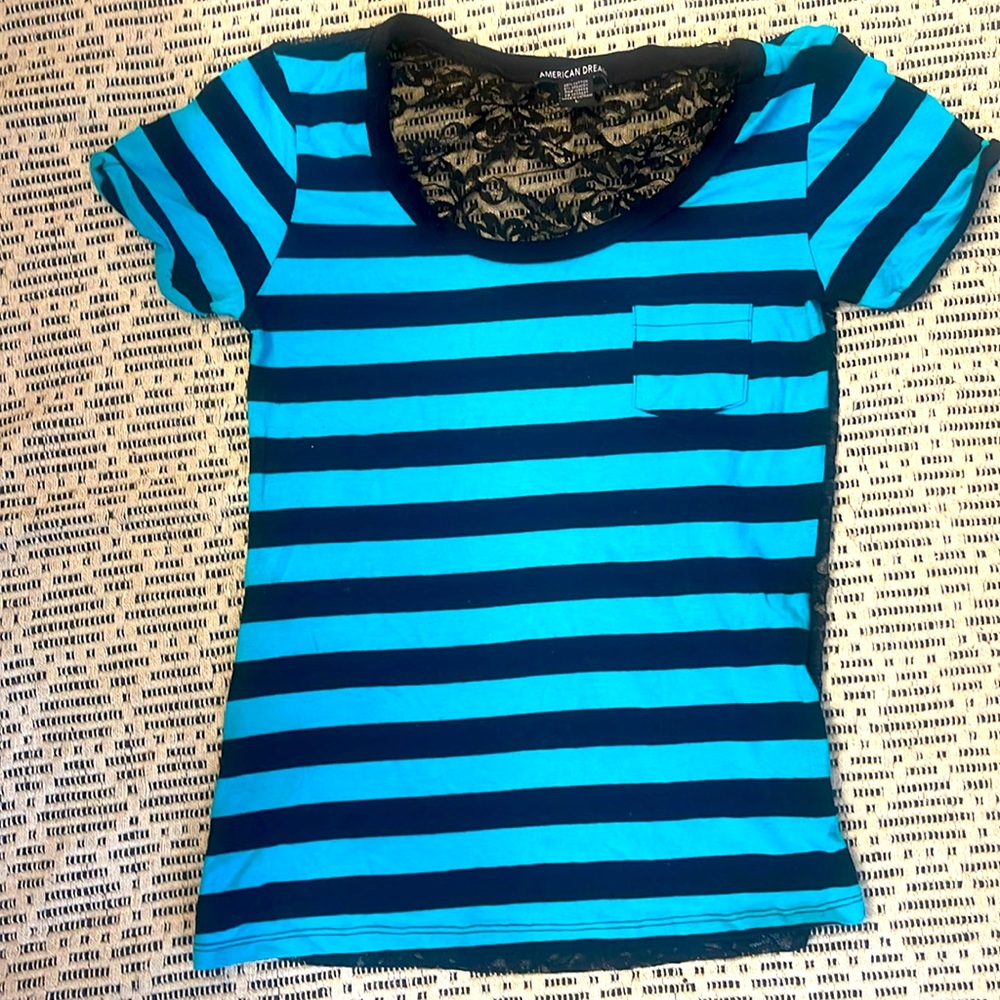 Teal/black shirt, back of the shirt is sheer lace. Size junior Large. Worn